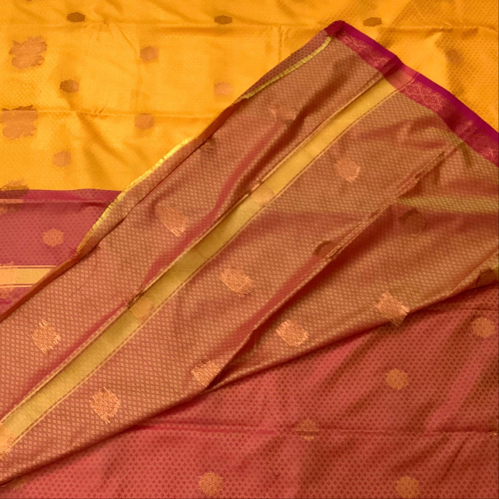 Saffron Maroon Pure Silk Saree With Golden Zari Floral Pallu