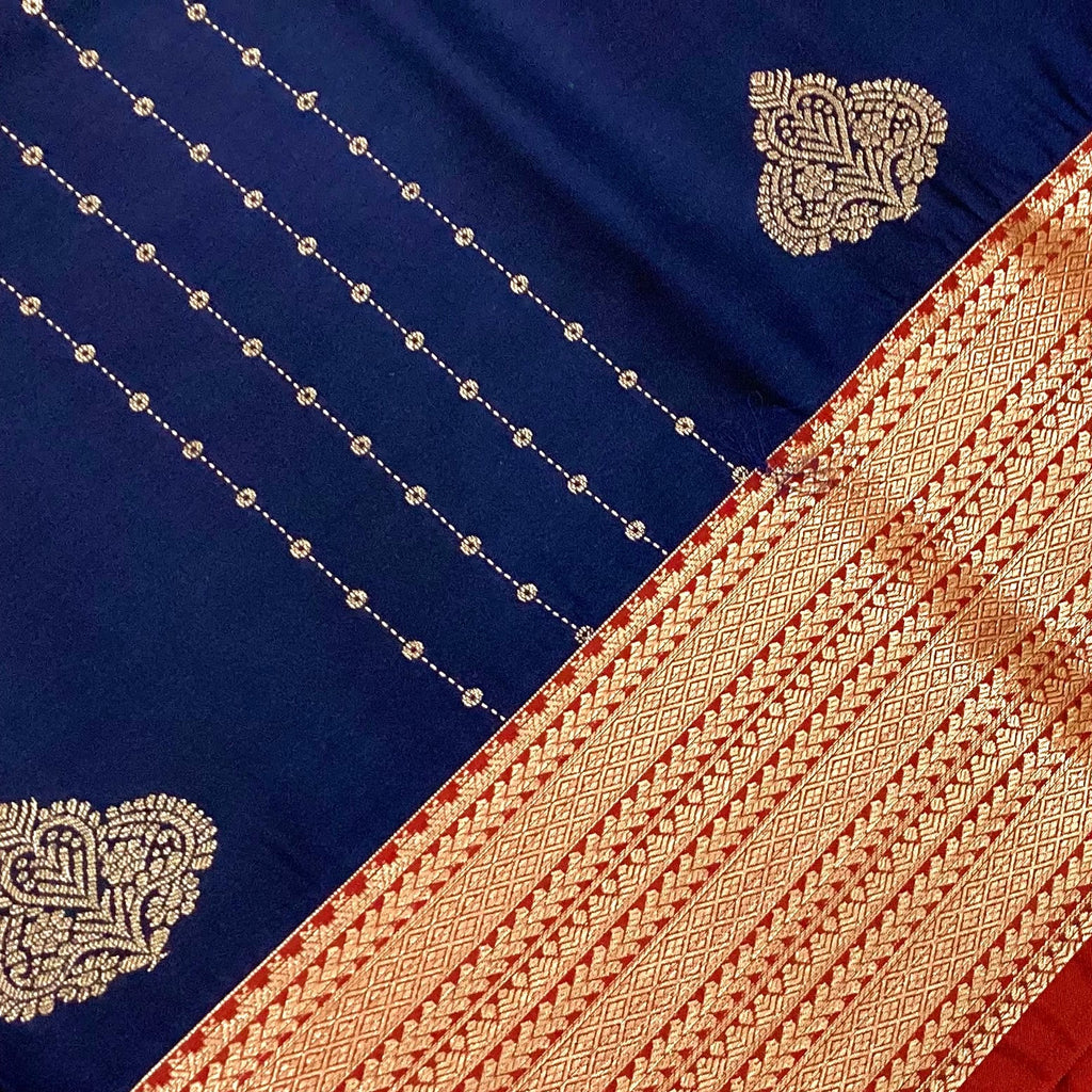 Royal Blue Silver Buti Woven Saree Pale Peach Pallu Crimson