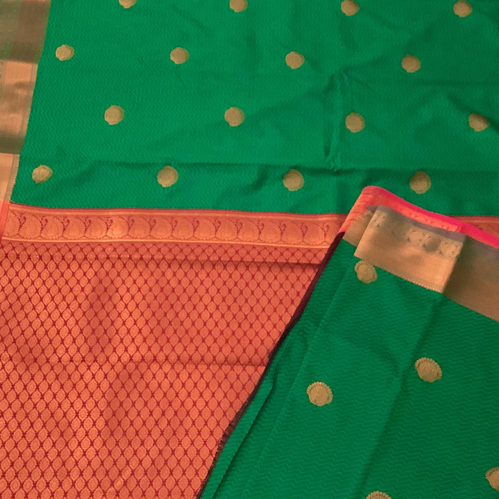 Emerald Green Silk Saree Copper Orange Pallu Gold Buttas Traditional