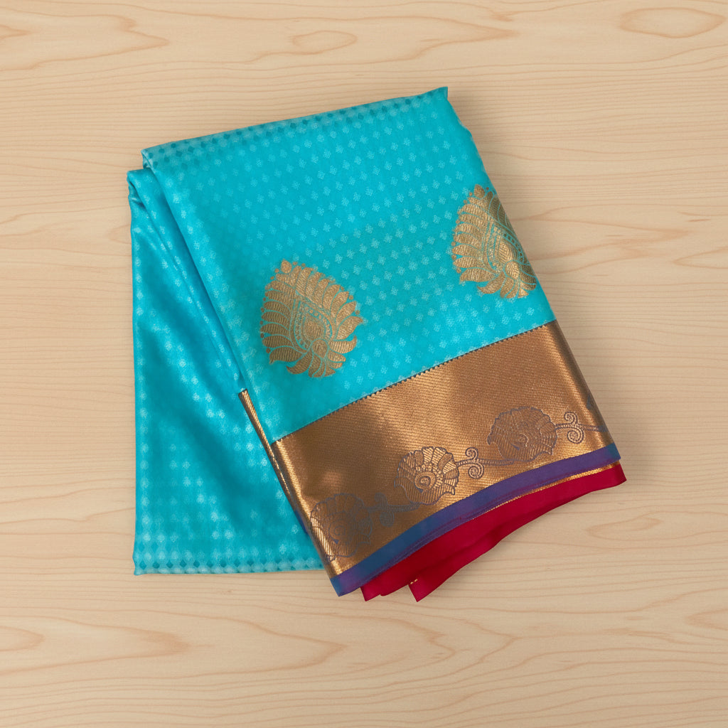 Turquoise Silk Saree with Magenta Pallu Antique Gold Zari Border