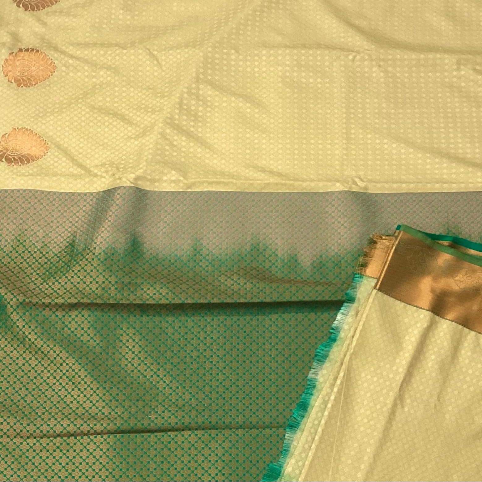 Cream Micro Diamond Saree with Teal Pallu and Copper Zari