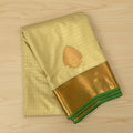 Cream Micro Diamond Saree with Teal Pallu and Copper Zari
