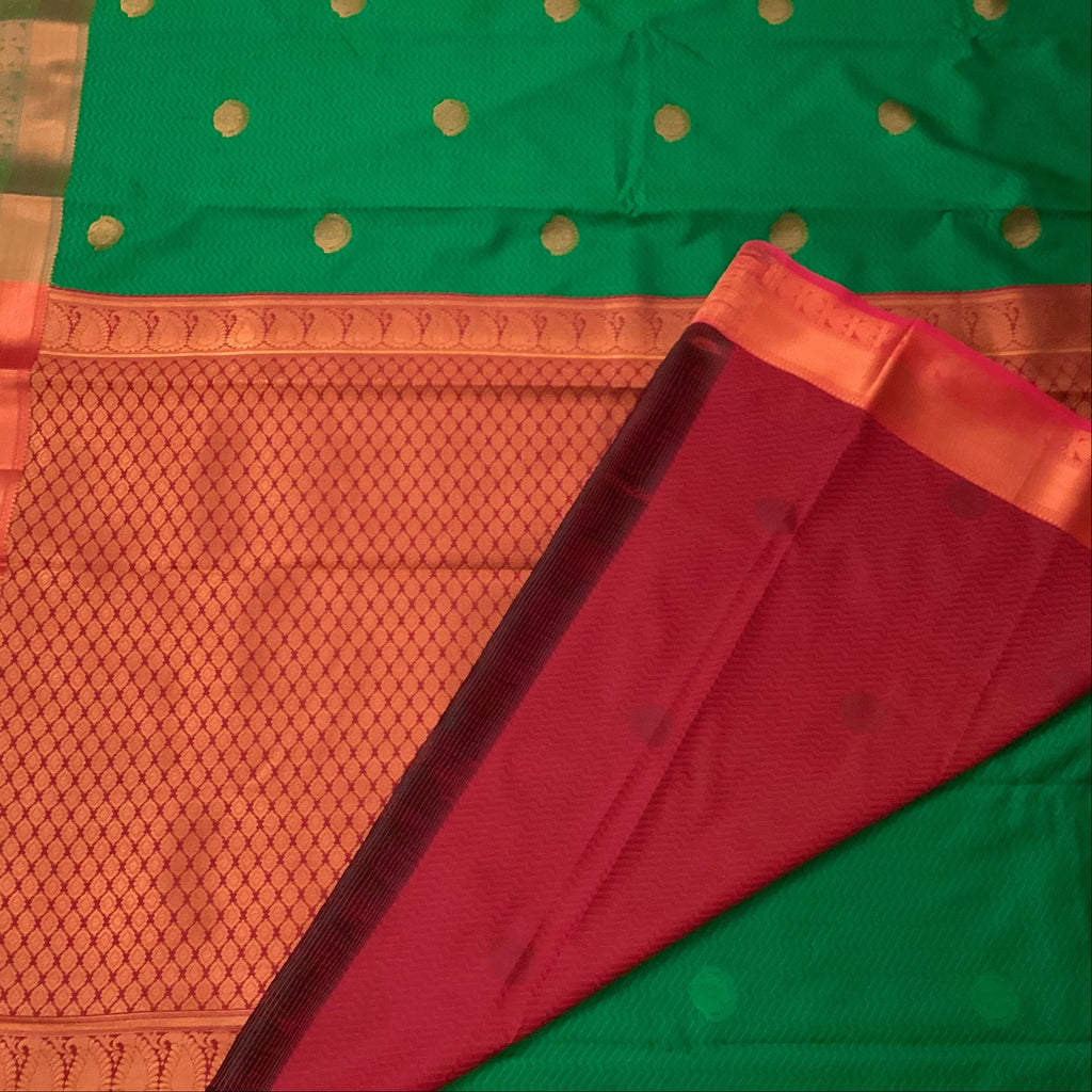 Emerald Green Silk Saree Copper Orange Pallu Gold Buttas Traditional