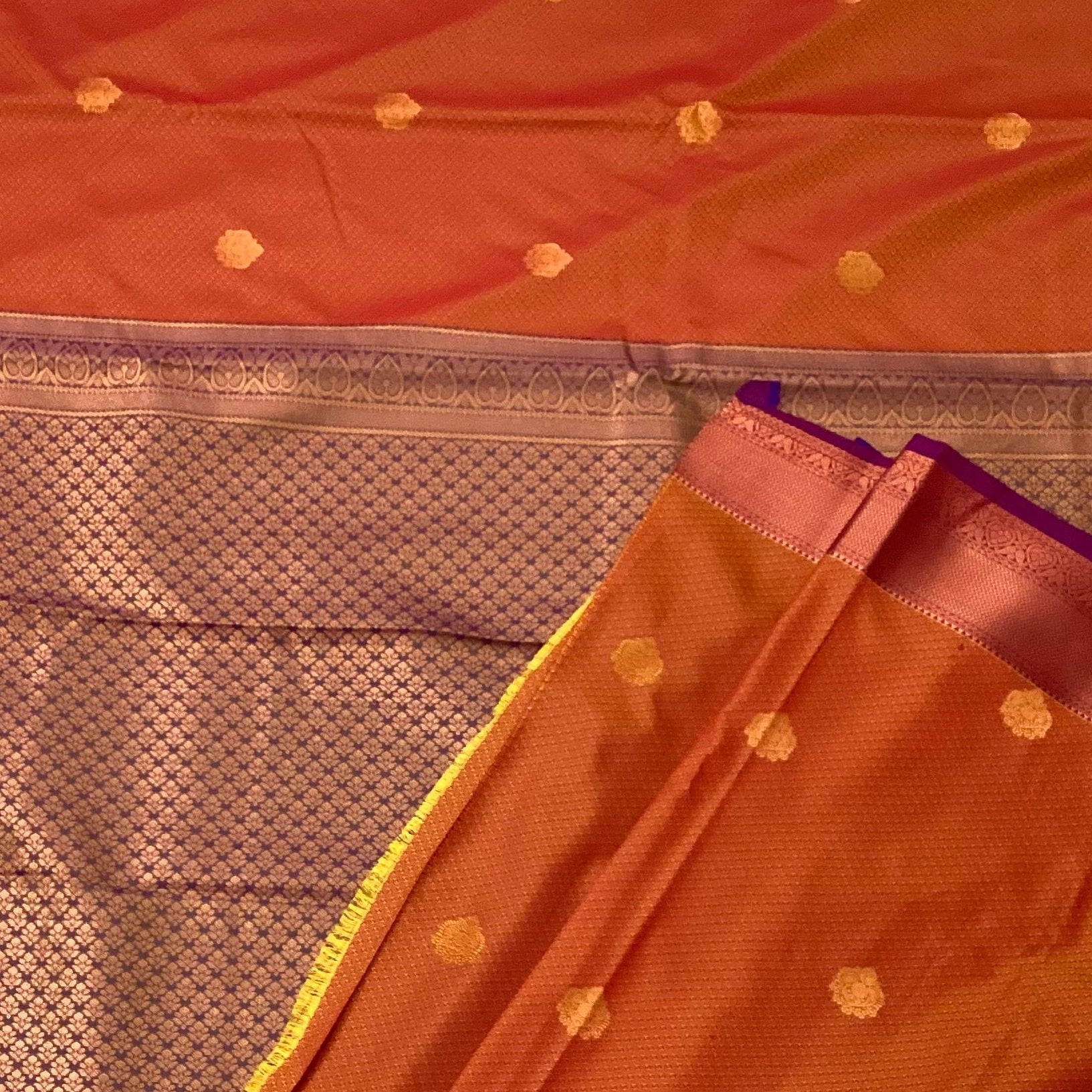 Rust Orange Silk Saree with Copper Buti and Purple Pallu