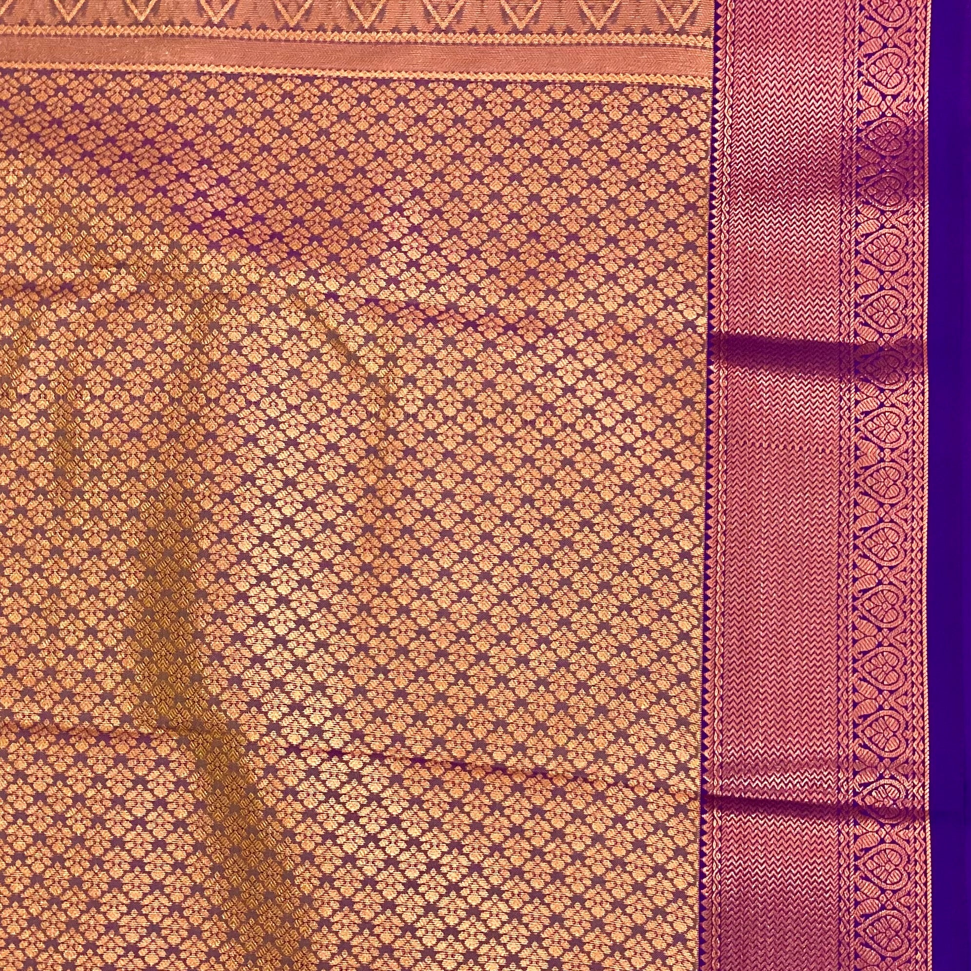 Rust Orange Silk Saree with Copper Buti and Purple Pallu