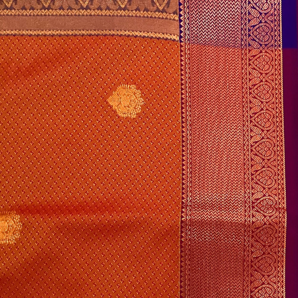Rust Orange Silk Saree with Copper Buti and Purple Pallu