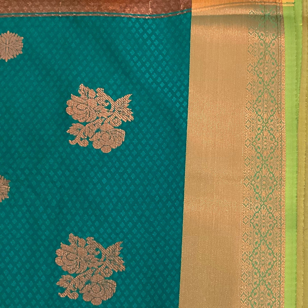 Elegant Teal Maroon Silk Saree Copper Floral Buttas Woven Border
