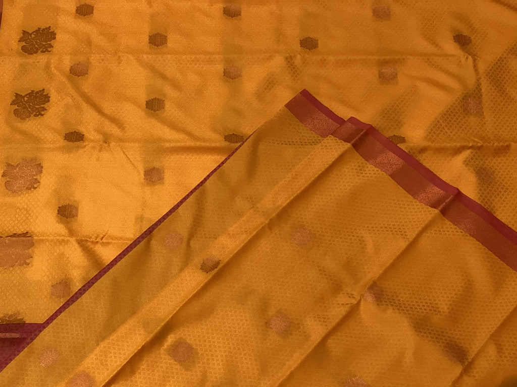 Saffron Maroon Pure Silk Saree With Golden Zari Floral Pallu