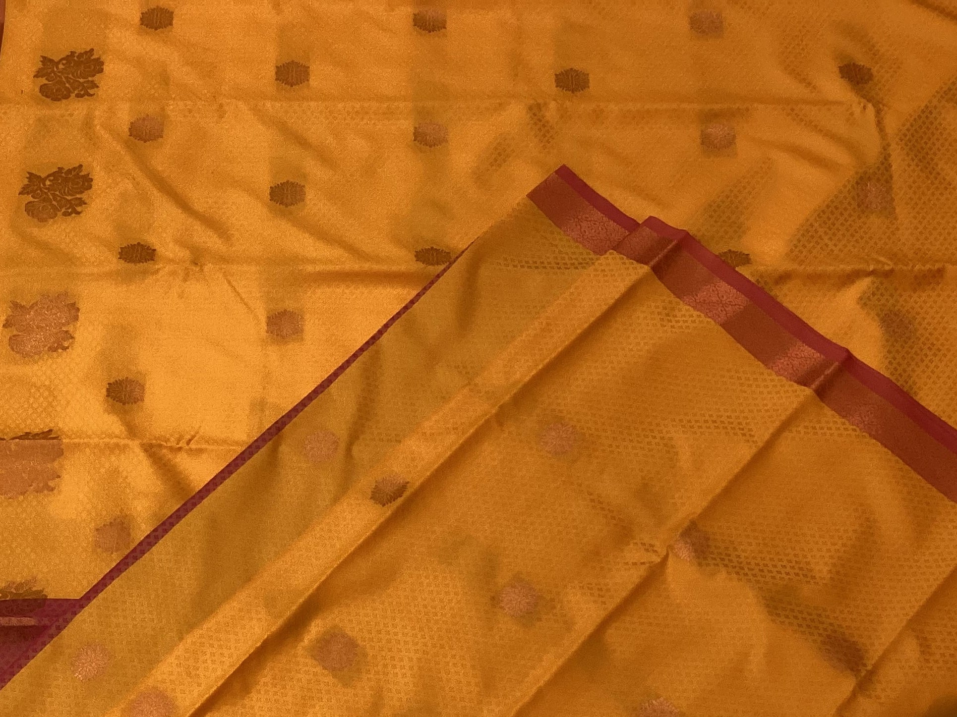 Saffron Maroon Pure Silk Saree With Golden Zari Floral Pallu