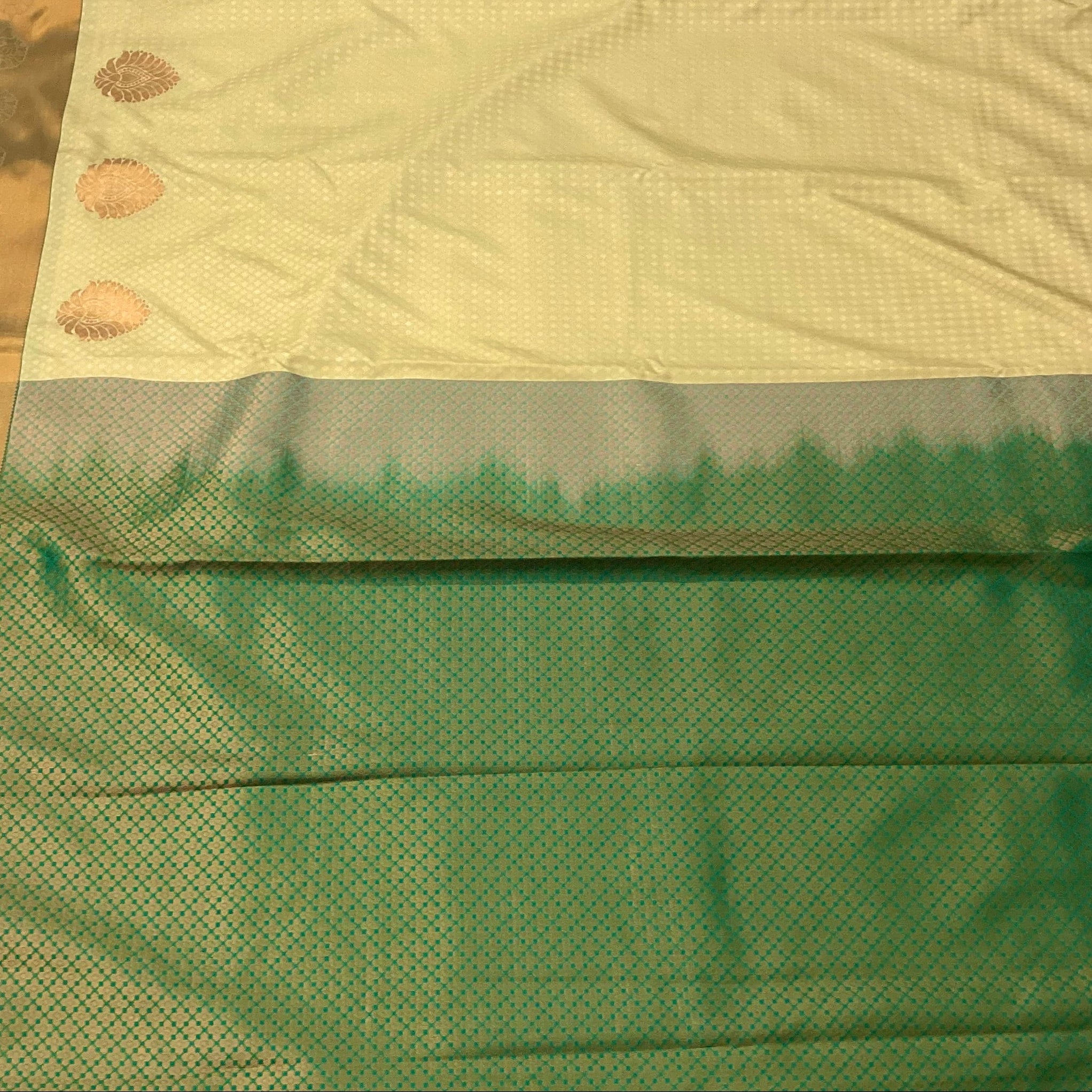Cream Micro Diamond Saree with Teal Pallu and Copper Zari