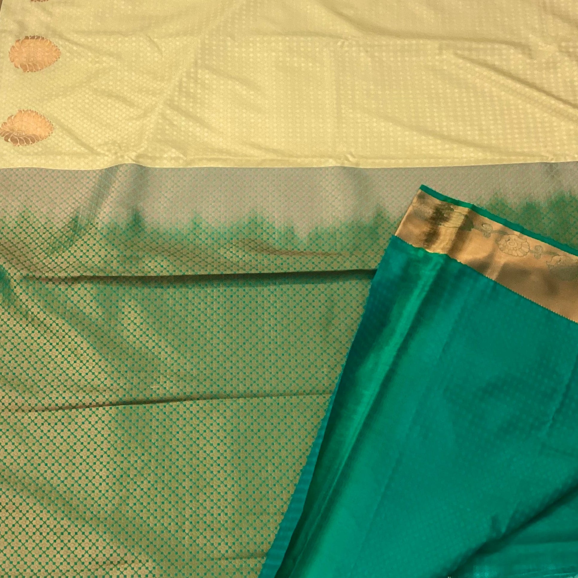 Cream Micro Diamond Saree with Teal Pallu and Copper Zari
