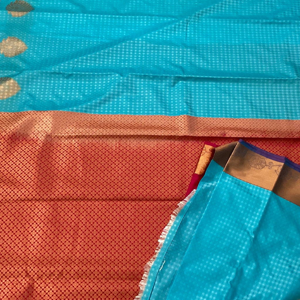 Turquoise Silk Saree with Magenta Pallu Antique Gold Zari Border
