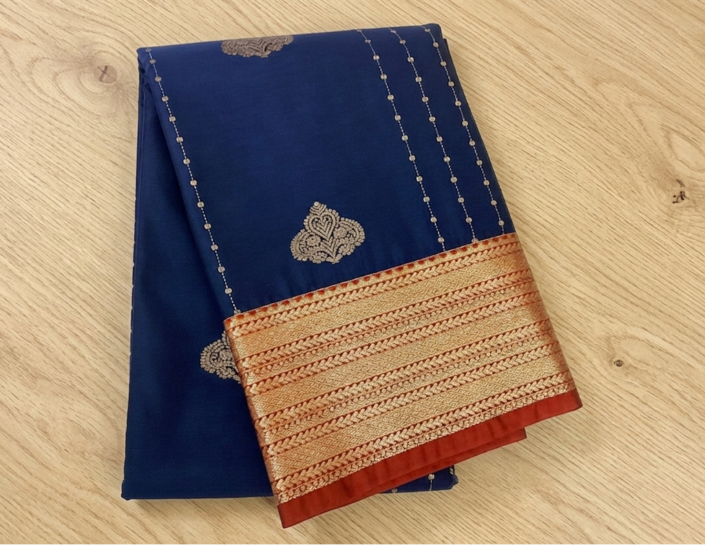 Royal Blue Silver Buti Woven Saree Pale Peach Pallu Crimson