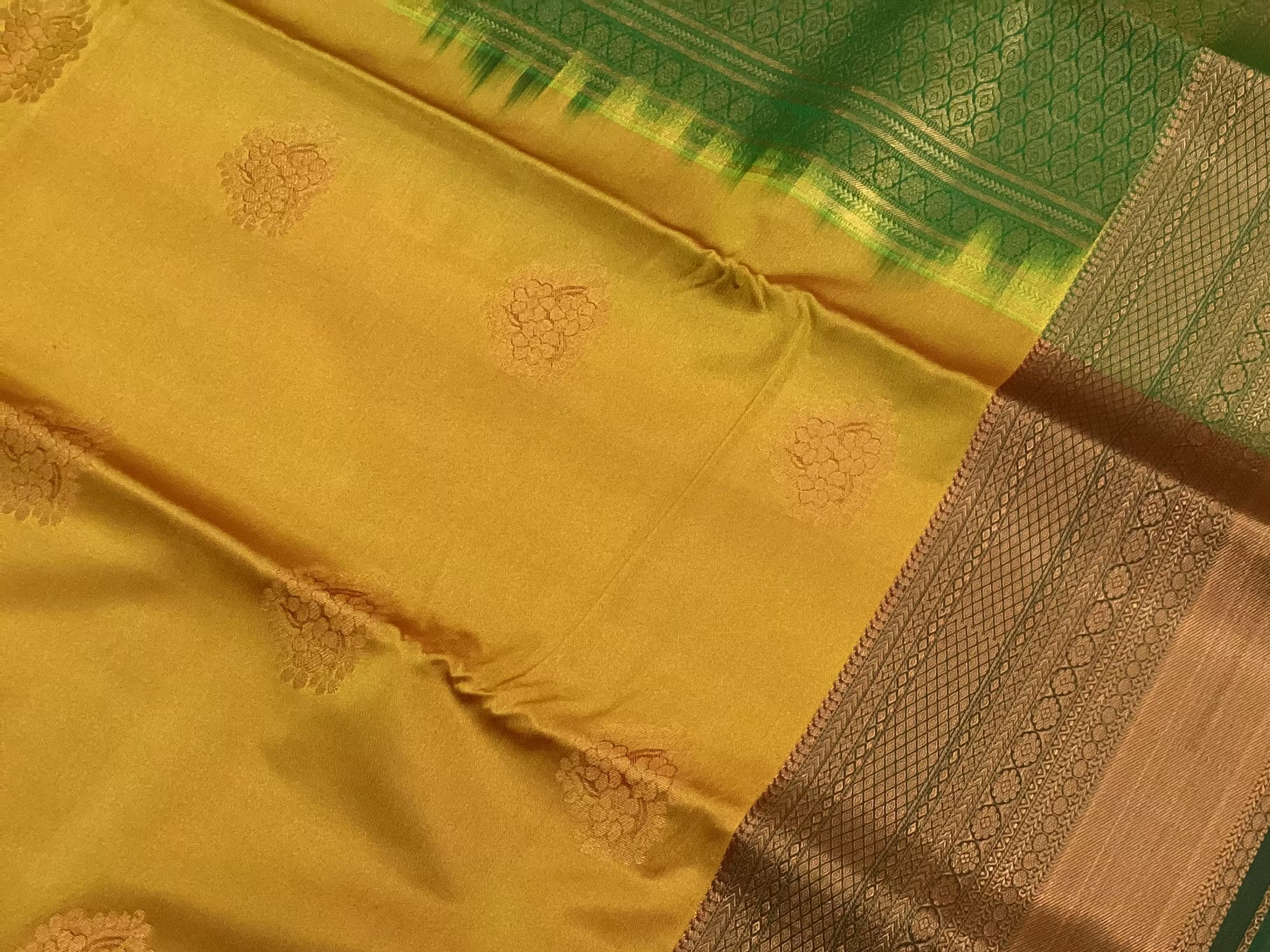 Mustard Gold Silk Saree With Emerald Pallu And Copper Zari