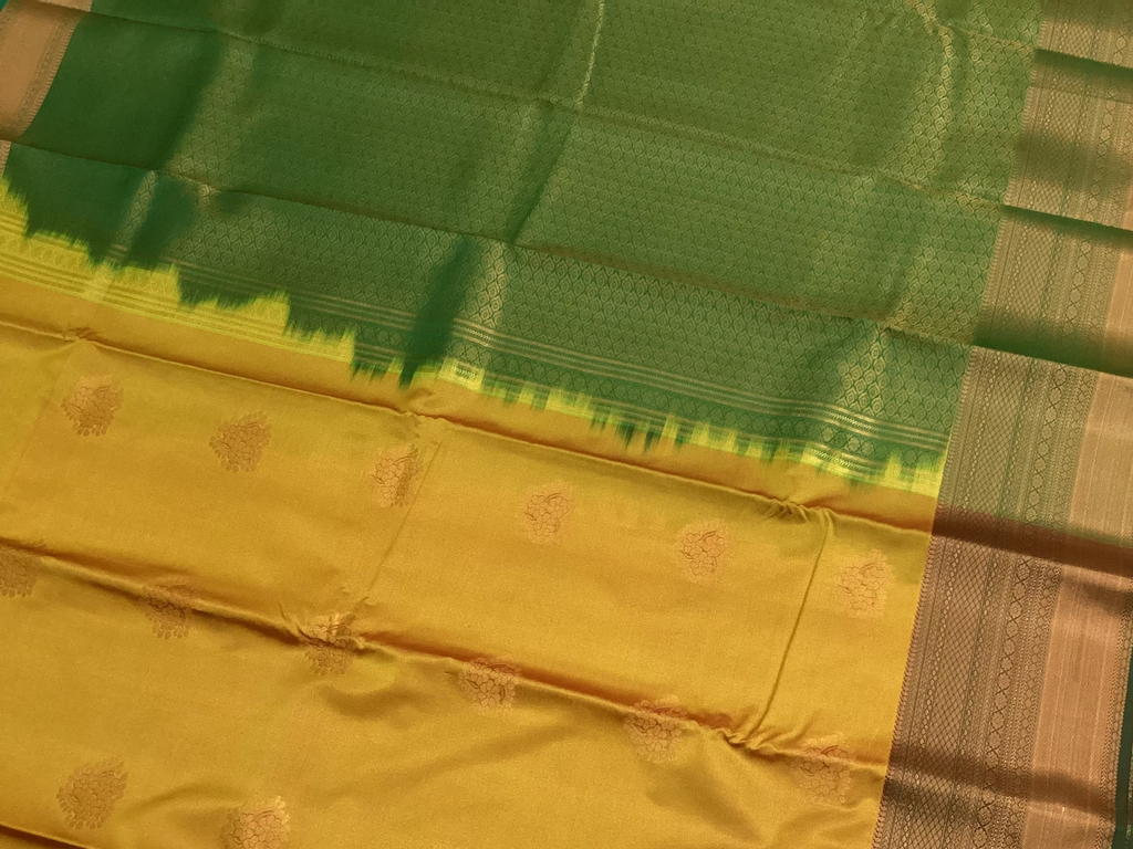 Mustard Gold Silk Saree With Emerald Pallu And Copper Zari