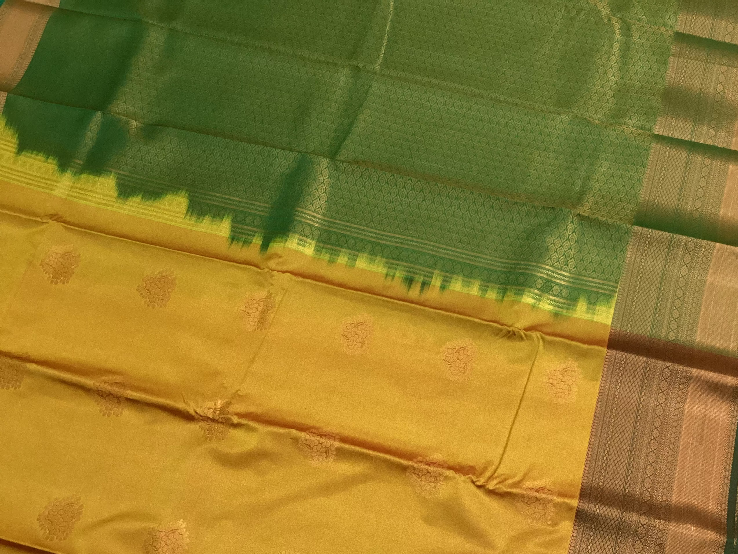 Mustard Gold Silk Saree With Emerald Pallu And Copper Zari