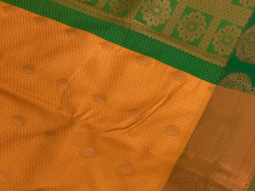 Saffron Orange Silk Saree Emerald Green Zari Pallu Festive Wedding