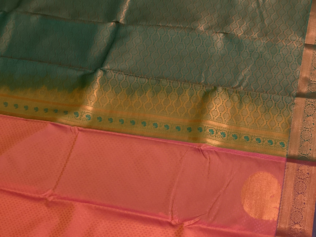 Coral Pink Silk Saree with Teal Pallu and Antique Zari