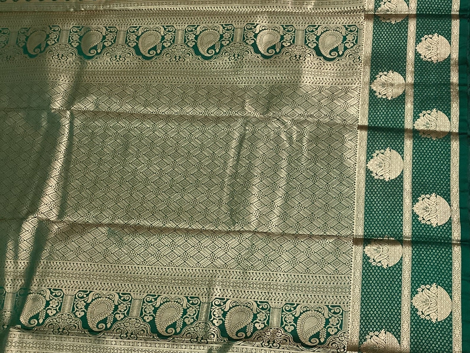 Rust Orange Silk Saree Teal Border Silver Zari Paisley Motifs