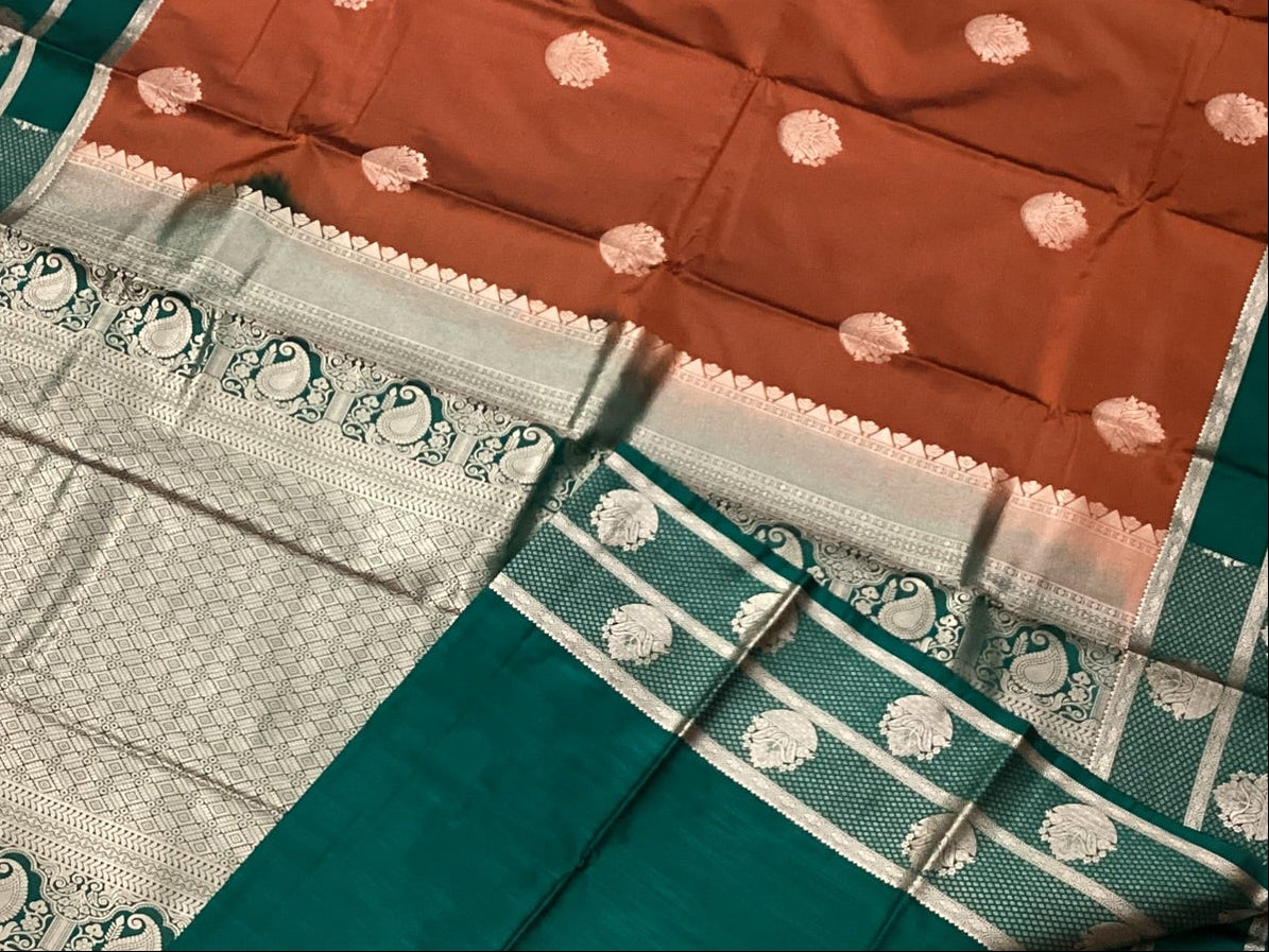 Rust Orange Silk Saree Teal Border Silver Zari Paisley Motifs