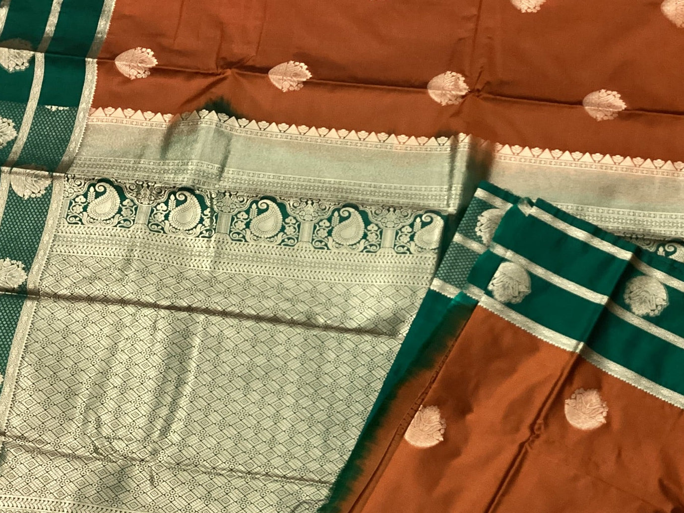 Rust Orange Silk Saree Teal Border Silver Zari Paisley Motifs