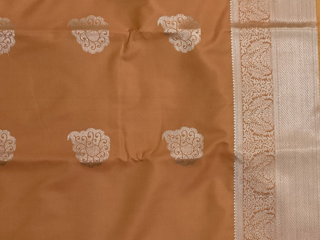 Teal And Burnt Orange Paisley Saree With Silver Brocade Border