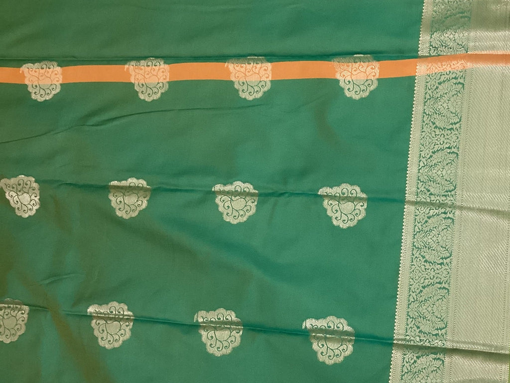 Teal And Burnt Orange Paisley Saree With Silver Brocade Border