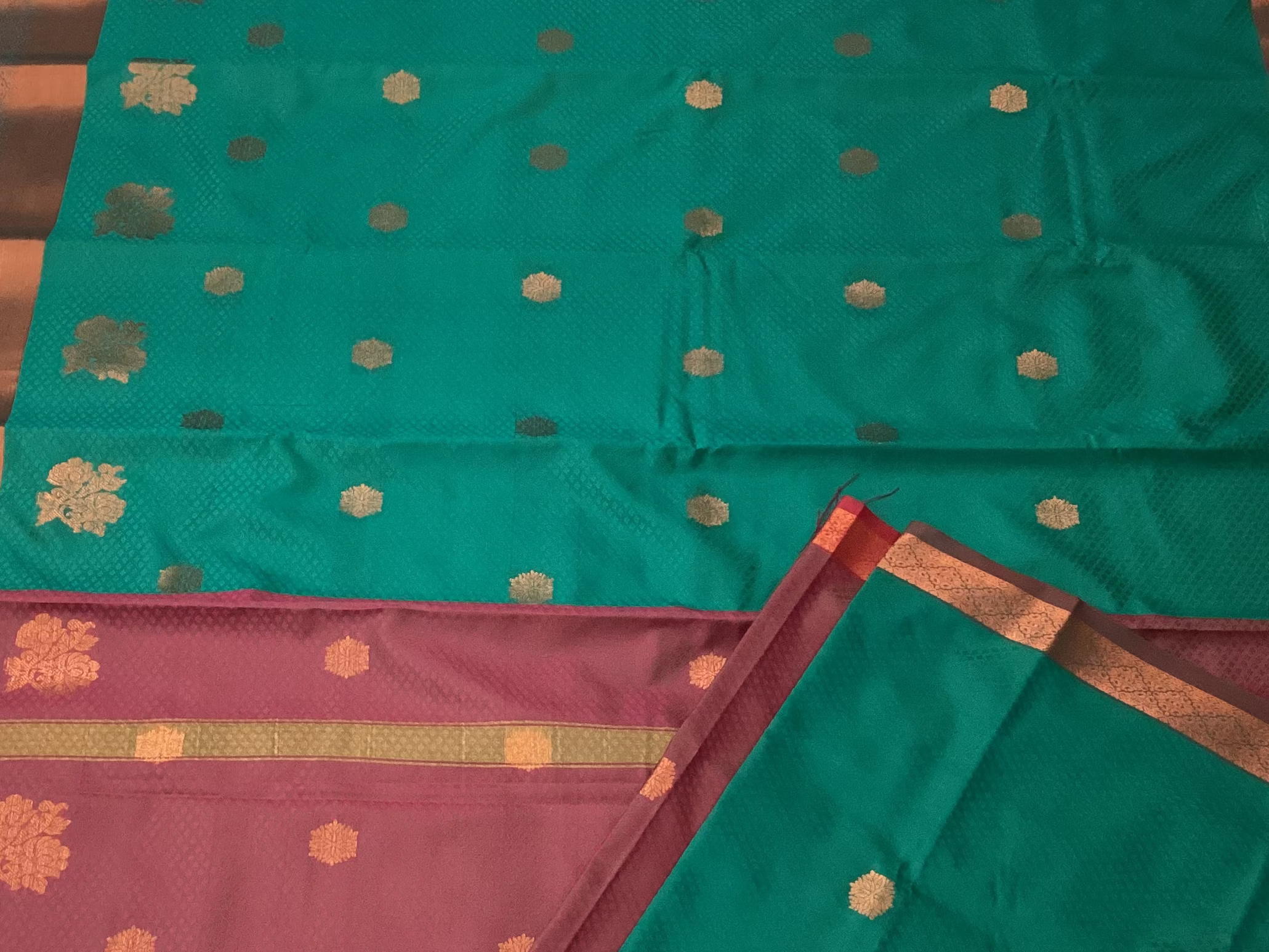 Teal Burgundy Silk Saree Copper Zari Floral Motifs Contrast Border